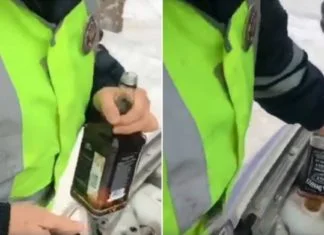 Policajci doskočili zimi: Ostali bez tečnosti za stakla, pa u automobil sipali viski (VIDEO)